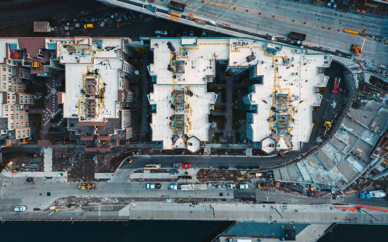 Aerial view of rooftops and a construction site in Seattle